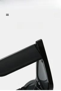 Macro detail of high-gloss black cat-eye sunglasses showing durable metal hinges and frames