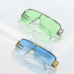 Fashionable Y2K rimless sunglasses with gradient lenses and geometric metal accents