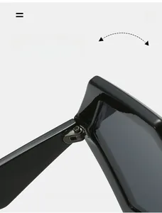 Macro view of durable metal hinge on black oversized hexagonal sunglasses frames