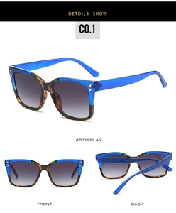 Detail view of square blue tortoiseshell sunglasses with leaf rivets and side profiles