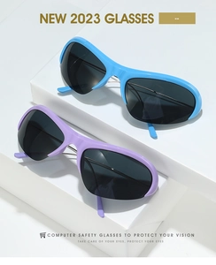 Sky blue and light purple sporty cat-eye sunglasses on geometric display stands
