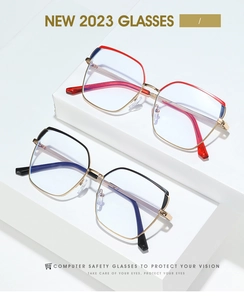 Close-up of red and black metal eyeglass frames with anti-blue light lenses