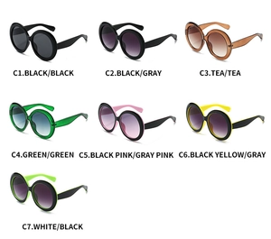 Grid display of oversized round sunglasses in seven color variants with thick retro frames