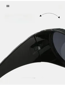 Close-up of durable hinge structure on black glossy oval vintage sunglasses