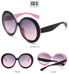 Detailed views of round pink and black frames with purple gradient lenses