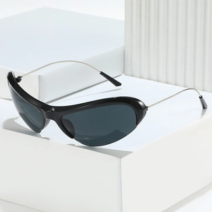 Streamlined black wrap-around sports sunglasses with silver metal temples on white blocks