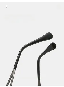 Close-up of curved mirror legs featuring ergonomic black ear tips and silver metal bars