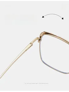Macro detail of durable metal hinge on dual-tone blue light blocking glasses frame