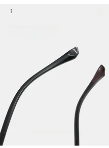 Close-up of ergonomic curved black temple legs on square spring frame glasses