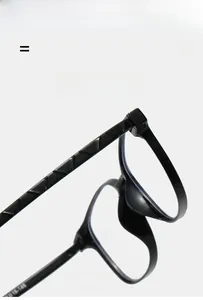 Detail of super elastic black frame with delicate textured temples and smooth hinges