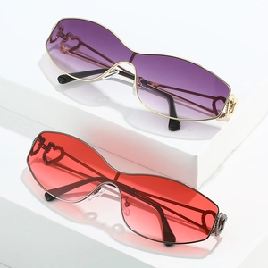 Y2K rimless heart sunglasses with gradient lenses and decorative hollow metal temples