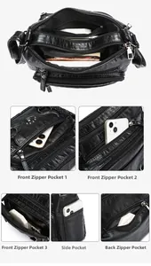 Detail view of multi-pocket black soft leather crossbody bag with multiple zip compartments