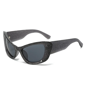 Oversized black cat eye sunglasses with glitter starry frame and dark grey lenses