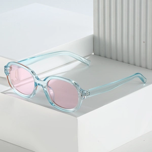 Retro square sunglasses with light blue transparent frame and pink lenses on display