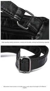 Detail of black faux leather texture and adjustable dark metal strap buckle on bag