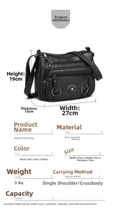 Detailed view of black multi-pocket crossbody bag with dimensions and material specifications