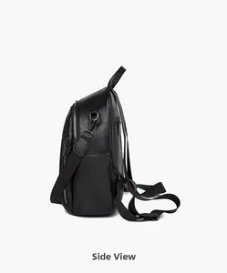 Side view of black lychee texture leather backpack with silver zippers and pockets