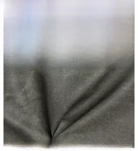 Detailed texture of charcoal grey high-density fabric with premium glossy finish