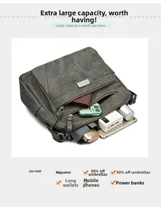 Detail showing high-capacity interior of grey PU leather crossbody bag with multiple pockets