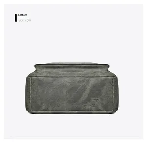 Detailed bottom view of large capacity dark grey crossbody bag with reinforced stitching