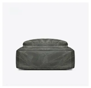 Detailed bottom view of dark grey crossbody bag showing reinforced double stitching