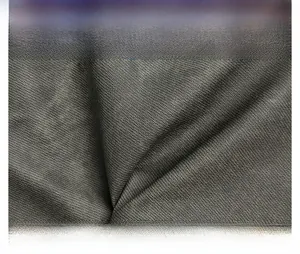 Macro shot of durable dark gray twill fabric texture on the spacious shoulder bag