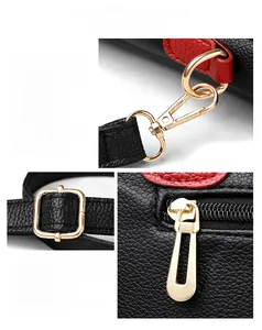 Close-up of golden hardware accessories and lychee texture leather on a handbag