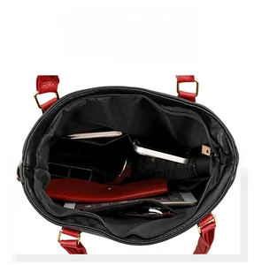 Top view of large capacity tote bag interior with multiple pockets and organized items