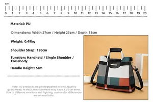 Crossbody bag with geometric stripes showing dimensions 27x23x13cm and 0.49kg weight