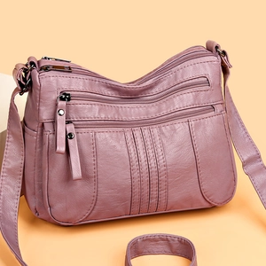 Fashionable mauve soft PU leather shoulder bag with multiple zippered pockets for women