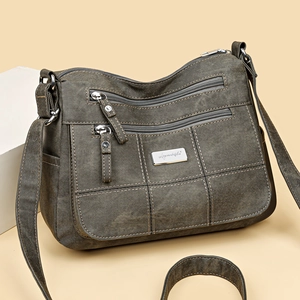 Deep olive green multi-pocket crossbody bag for women with adjustable wide shoulder strap