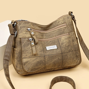 Vintage brown crossbody bag with multi-zipper pockets and quilted texture for women
