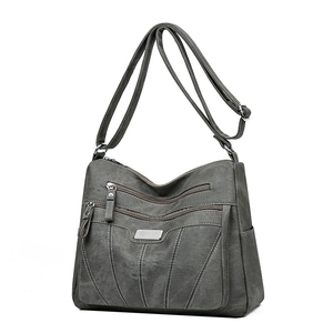 Minimalist grey large capacity crossbody bag with multi-layer zippers and embroidery