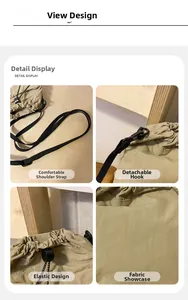 Detail view of khaki nylon phone bag with drawstring closure and detachable strap