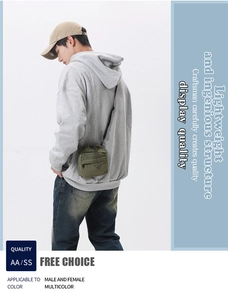 Detail of lightweight olive green nylon crossbody bag with drawstring and adjustable strap