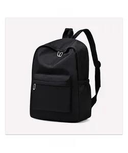 Detail of waterproof black oxford fabric backpack with front zipper pocket and side mesh pouch