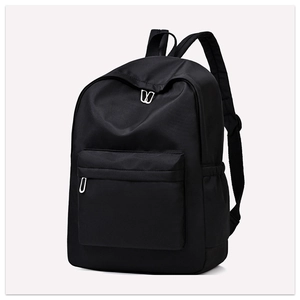 Detailed view of waterproof black oxford backpack with silver metal zippers and side pockets