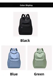 Detail view of water-resistant oxford backpacks in black, blue, and green color options
