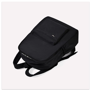 Detail view of the durable water-resistant nylon fabric and front zipper of the black backpack