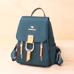 Sac à dos en nylon bleu cyan de grande capacité avec logo doré et design minimaliste