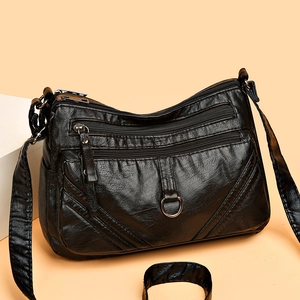 Sac à bandoulière noir multi-couches en cuir synthétique avec finitions métalliques
