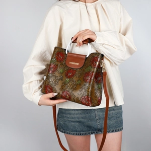 Retro satchel with red rose embossed pattern and adjustable shoulder strap for women