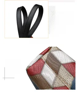 Detail view of multicolored patchwork tote bag showing sturdy handle and fine stitching