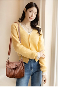 Brown soft PU leather crossbody bucket bag with drawstring detail and vertical zipper