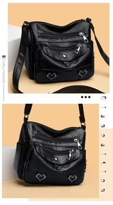 Detail of vintage black multi-zipper crossbody bag with heart-shaped metal buckles