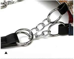 Close-up of durable silver plated metal chain buckle on a leather tote shoulder strap