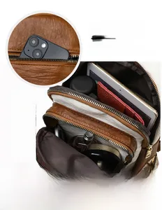 Detailed interior storage view of the retro contrast color shoulder bag for iPad mini