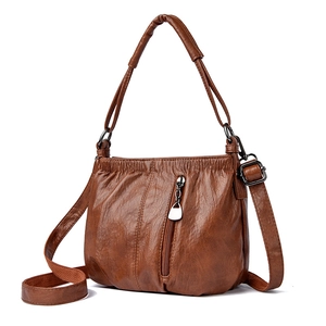 Brown soft PU leather bucket bag with tassel zipper and versatile shoulder straps