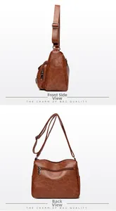 Detail view of brown soft faux leather crossbody bag with multiple zippers and side structure