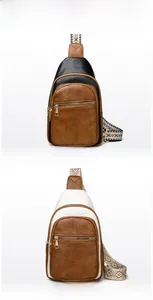 Detail of vintage crossbody bags with multi-compartments and ethnic style wide straps
